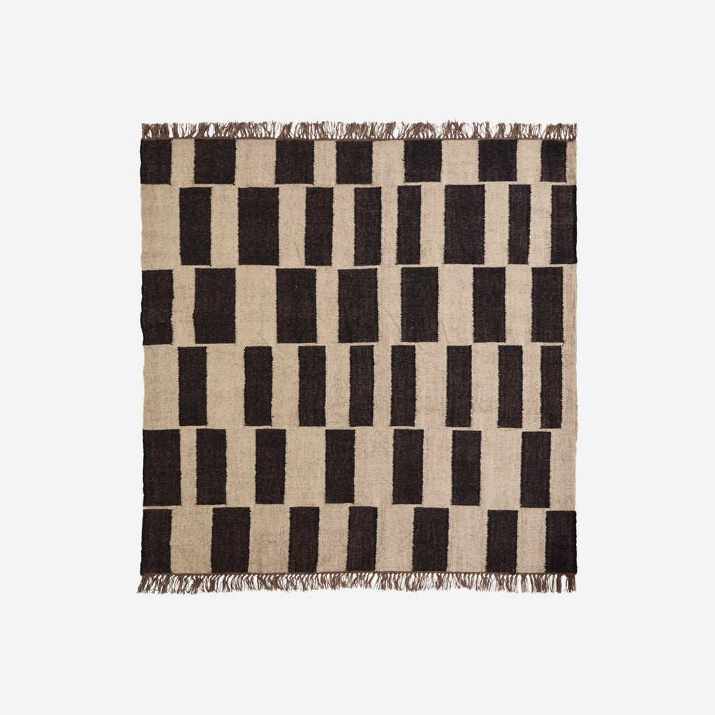 tapis géométrique noir et beige en laine et jute