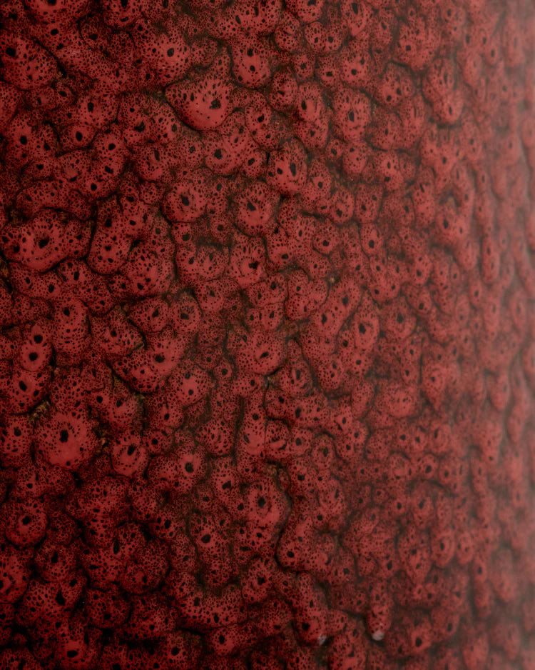 Table d'appoint géométrique en grès rouge 